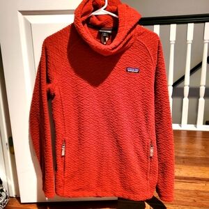 Patagonia orange Medium textured pullover with hood and zippered pockets